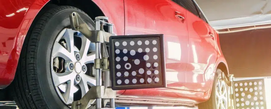Mercedes car undergoing wheel alignment service