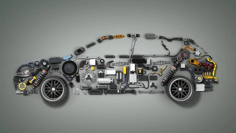 Disassembled auto components arranged in the silhouette of a sports car for a Porsche car service.