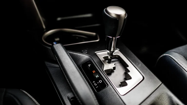 Automatic gear shift knob and lever for a Toyota Alphard gearbox.